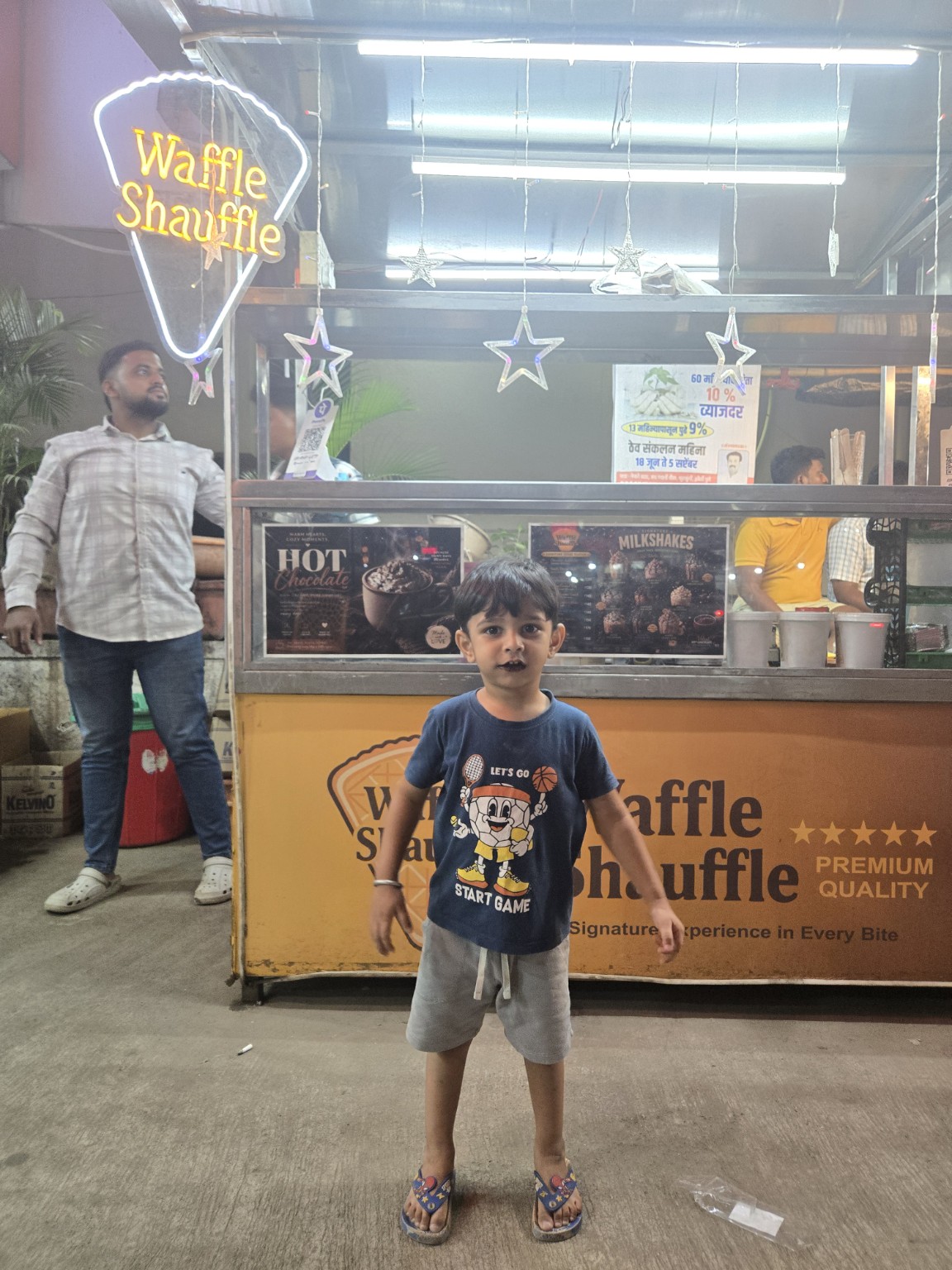 Child visiting Waffle Shauffle dessert shop at Harshwardhan Plaza in Bhekrai Nagar, Pune
